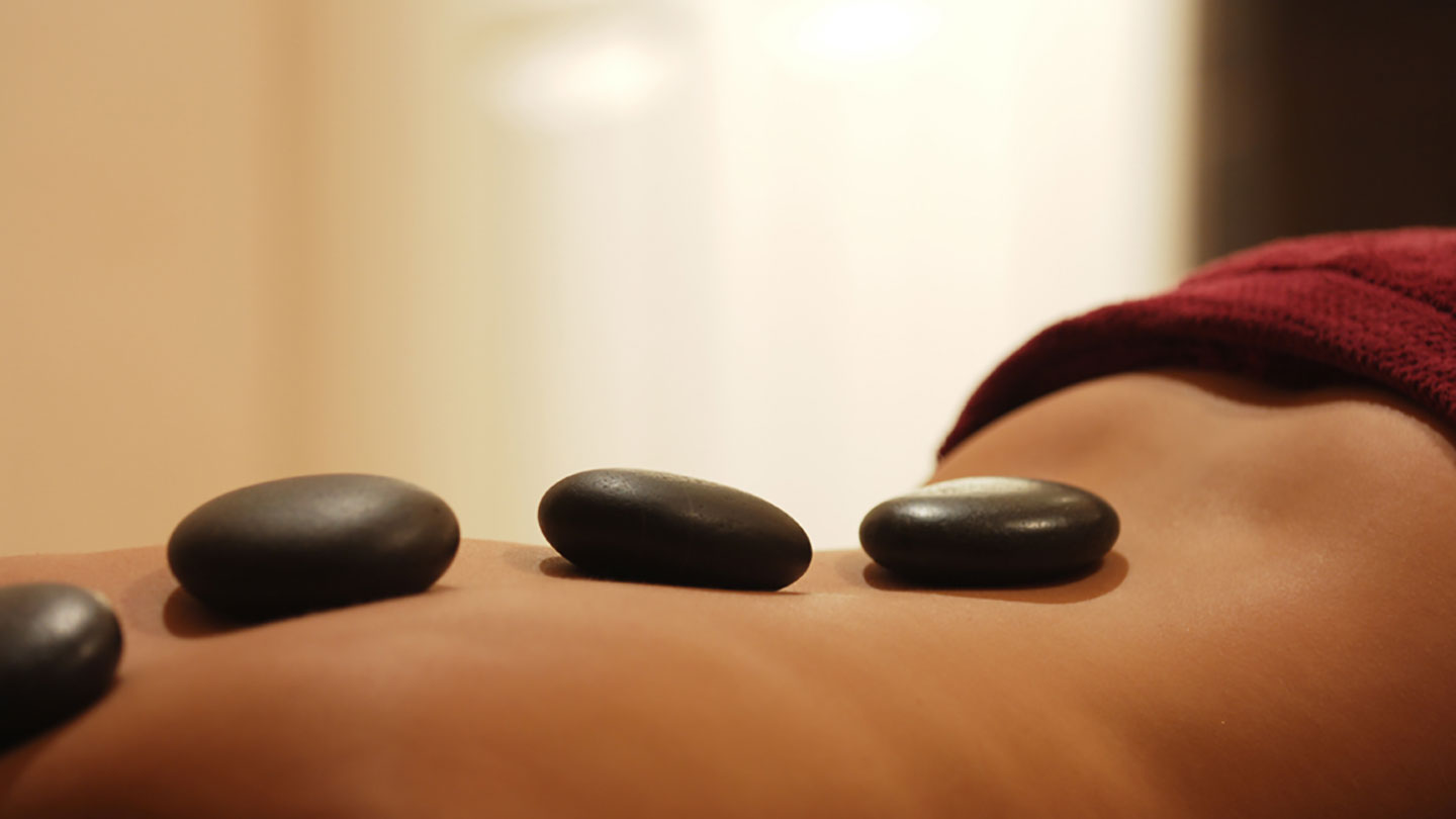 Discover the Benefits of Hot Stone Massage: Techniques and Tips